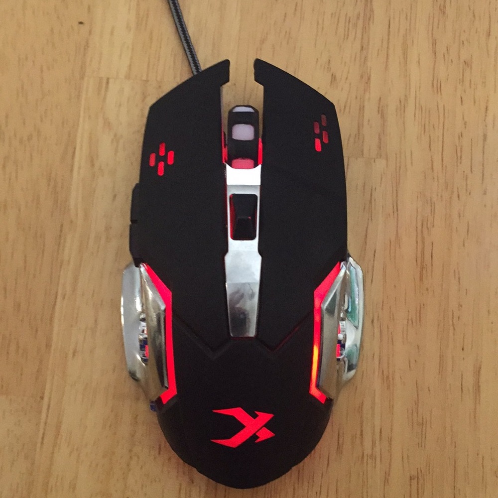 Rgb gaming mouse with 7 programmable buttons.